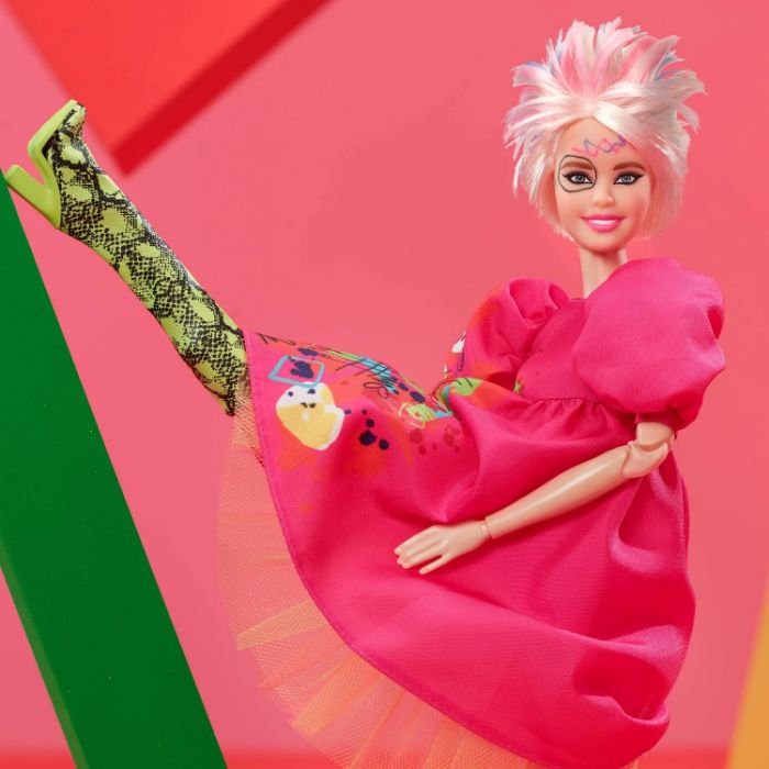 Weird Barbie with a quirky hairstyle, bright pink dress, and mismatched shoes. Weird Barbie with a quirky hairstyle, bright pink dress, and mismatched shoes.