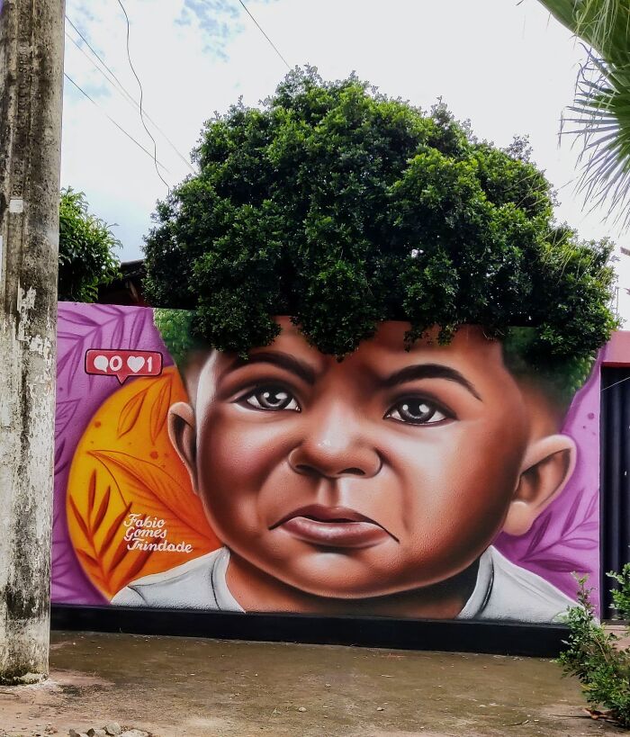 Street Artist Continues To Paint Portraits On Walls Next To Trees That Double As Hair Street Artist Continues To Paint Portraits On Walls Next To Trees That Double As Hair