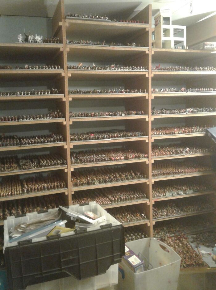 About 1/2 Of My Wargames Miniatures (Each Shelf Is 17 X 22 In, And The Unit Is Actually 5 Sections Wide - This Is Just The Centre)