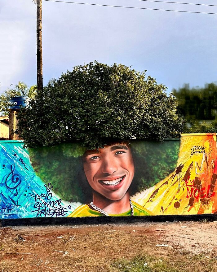 Street Artist Continues To Paint Portraits On Walls Next To Trees That Double As Hair Street Artist Continues To Paint Portraits On Walls Next To Trees That Double As Hair