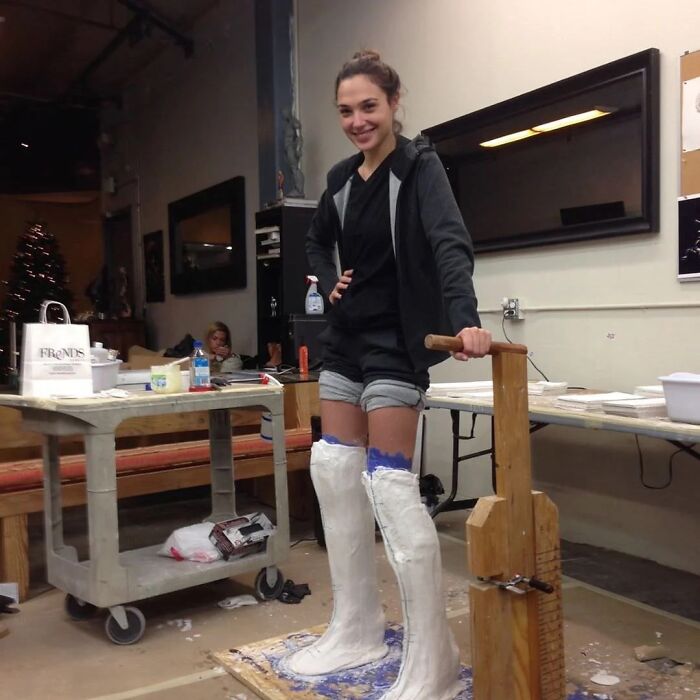 Gal Gadot Standing In Moulds For Her Wonder Woman Boots