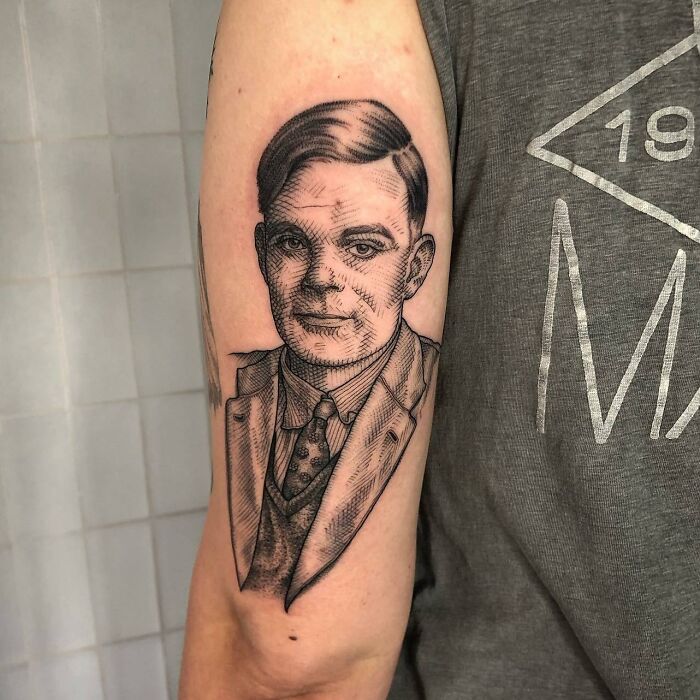 Alan Turing portrait tattoo on arm