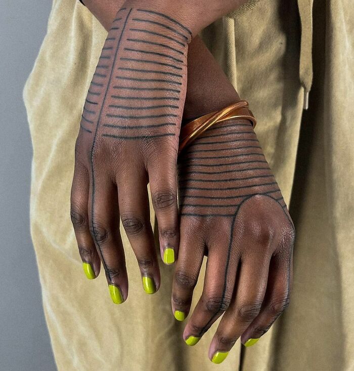 hand tribal line tattoos