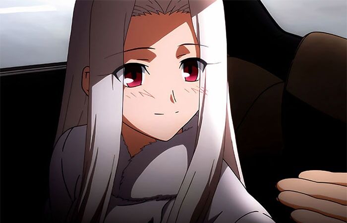 Anime character with long white hair and red eyes, smiling softly.