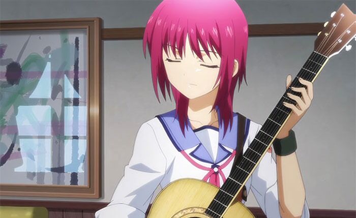 Anime female character with pink hair playing a guitar in a school setting.