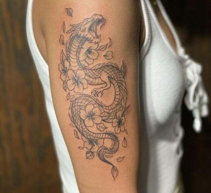 haku dragon tattoo with open mouth