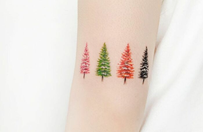 Seasons of trees colorful tattoo