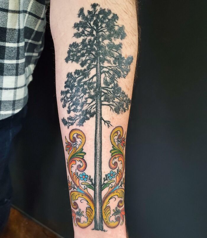 Red pine and rosemaling tattoo