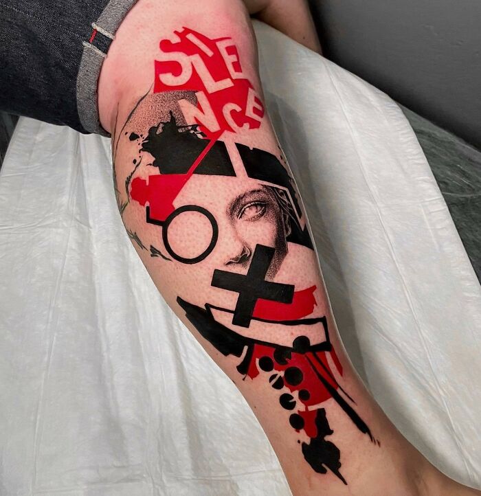 Trash Polka tattoo on arm with abstract shapes, bold red and black colors, and text elements.