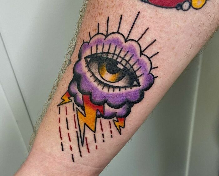American traditional stormy eye arm tattoo