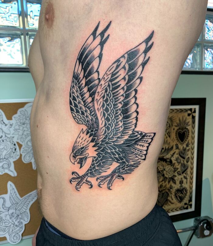 American traditional eagle ribs tattoo