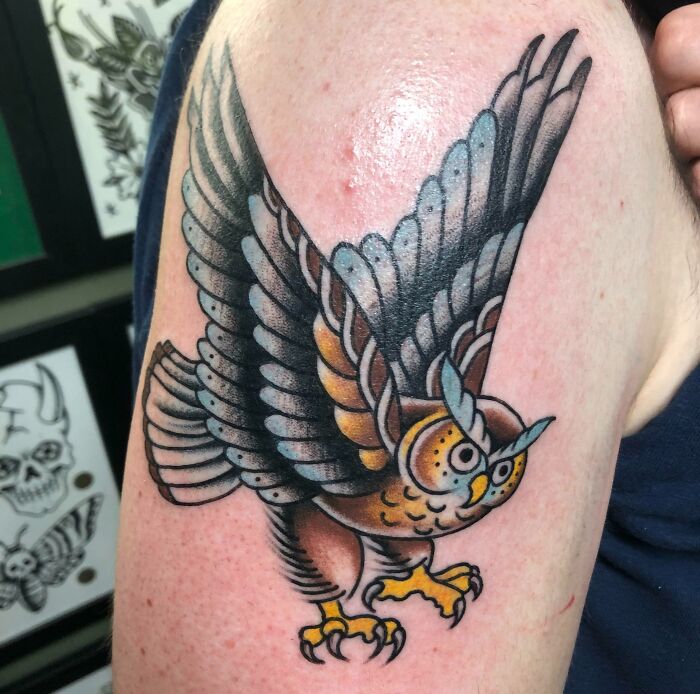 American traditional owl arm tattoo