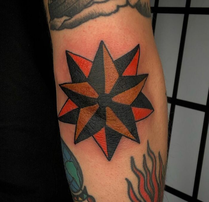 American traditional elbow tattoo