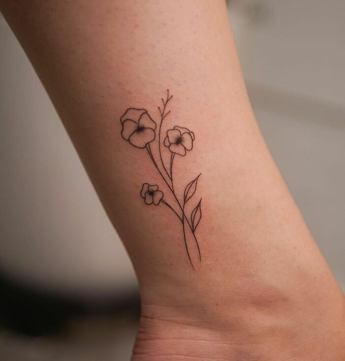 Flower ankle tattoo