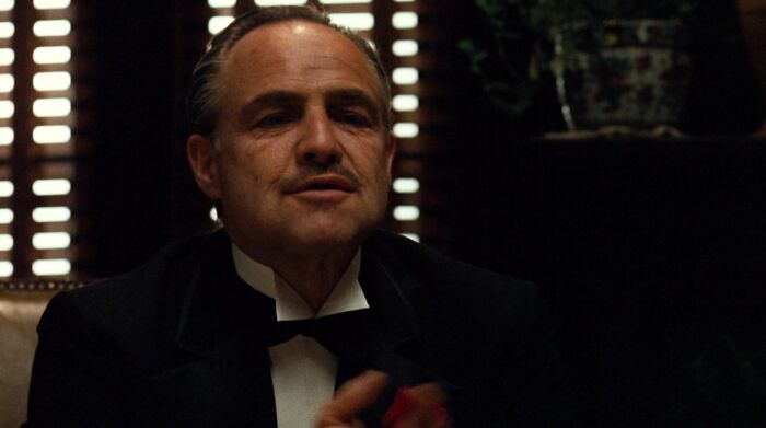 Don Vito Corleone discussing