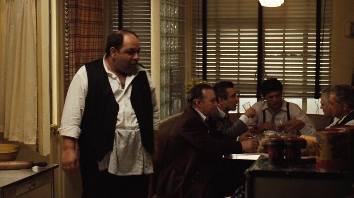 Peter Clemenza looking at the table 