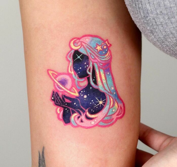 space girl arm tattoo