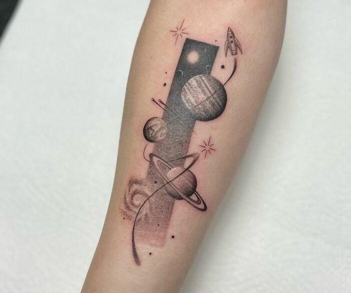 Planets arm tattoo
