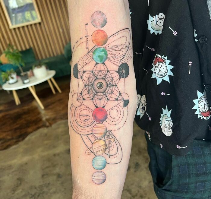 Metatron’s cube and the planets arm tattoo