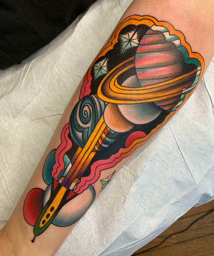 Retro Space arm tattoo