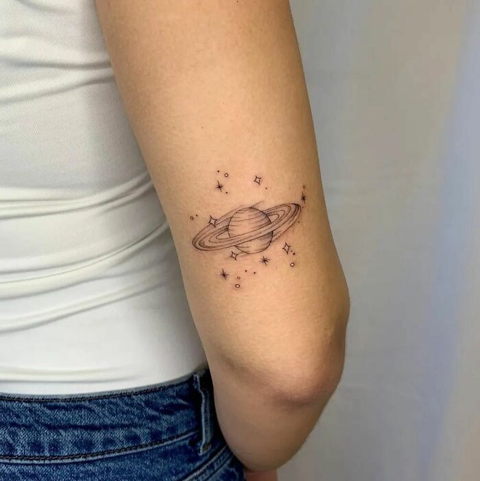 Saturn arm tattoo