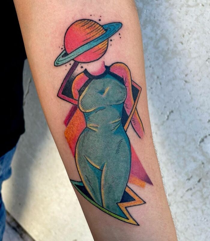 Space Lady with Saturn as a head arm tattoo