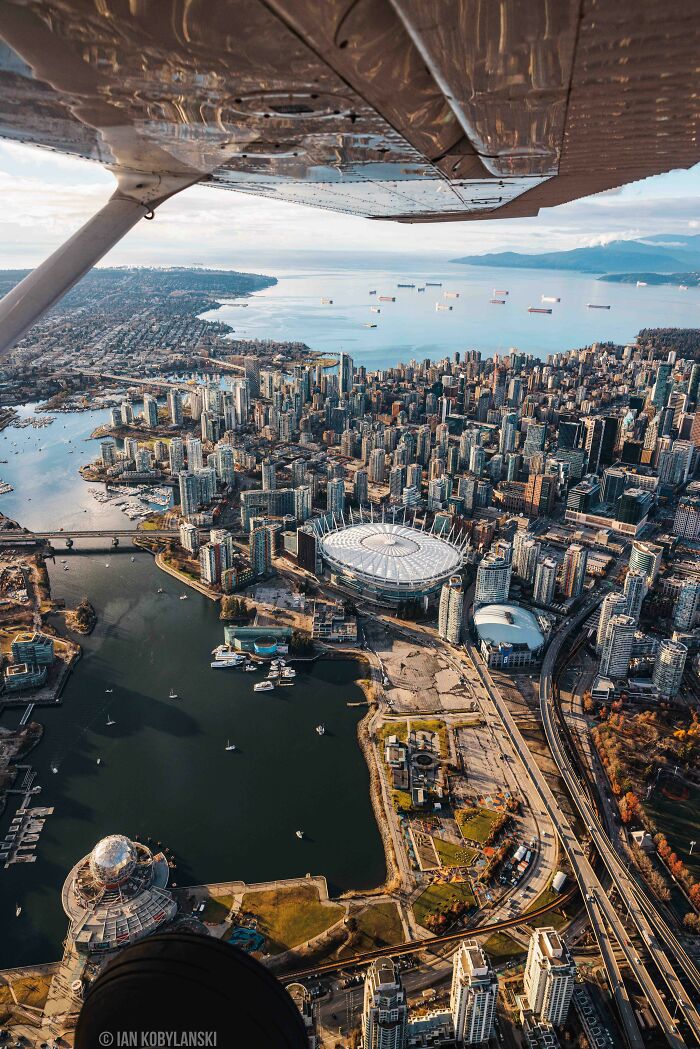 ITAP Of Downtown Vancouver’s Skyline From The Passenger Seat Of An Airplane