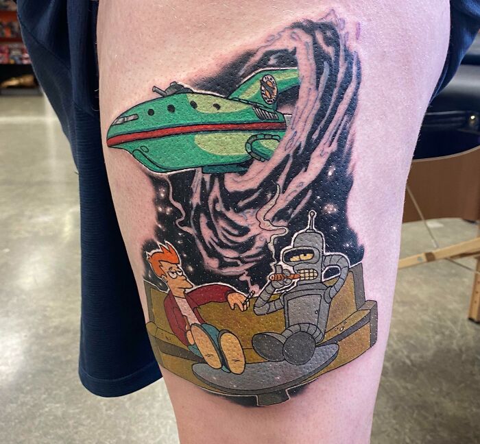 Space themed Futurama leg tattoo
