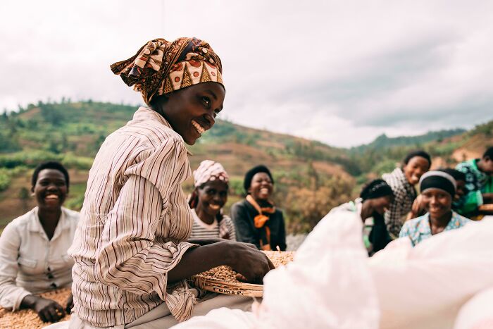 ITAP Of A Woman Sorting Coffee Beans In Rwanda