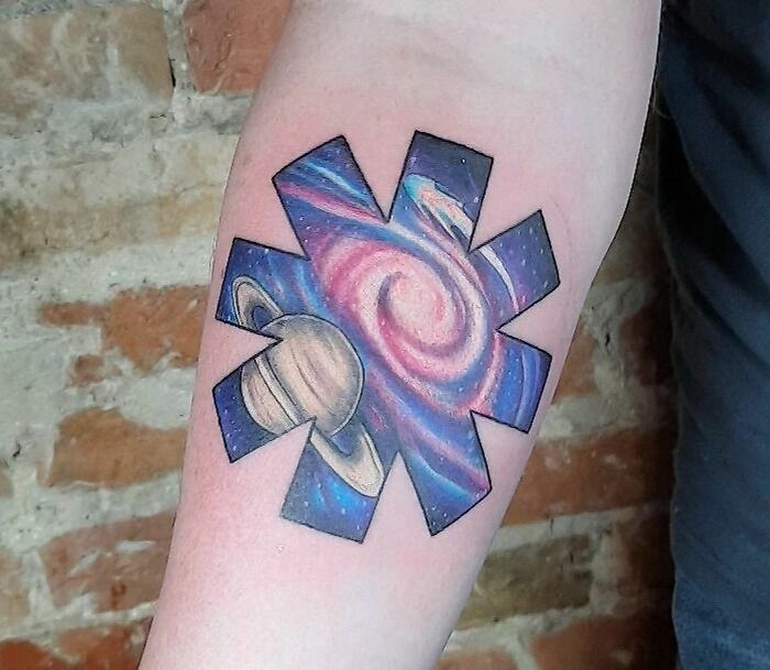 Space themed Red-Hot Chili Peppers logo tattoo