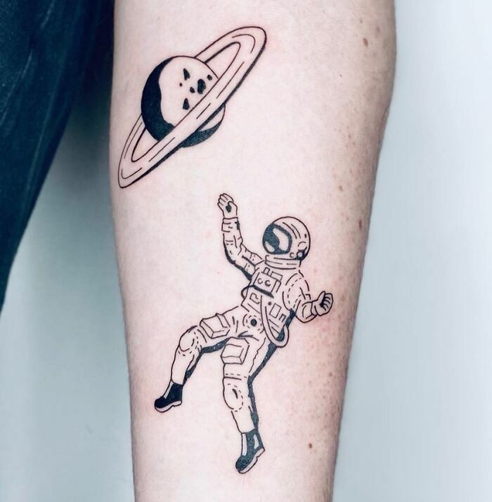 Astronaut and Saturn tattoo
