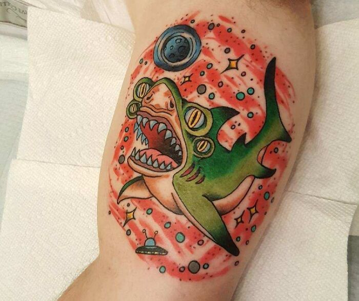 Space shark arm tattoo