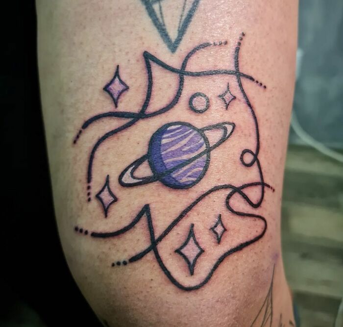 Saturn and stars tattoo