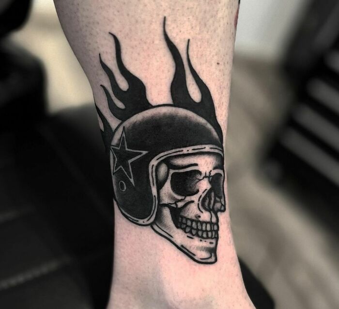 American traditional skull leg tattoo