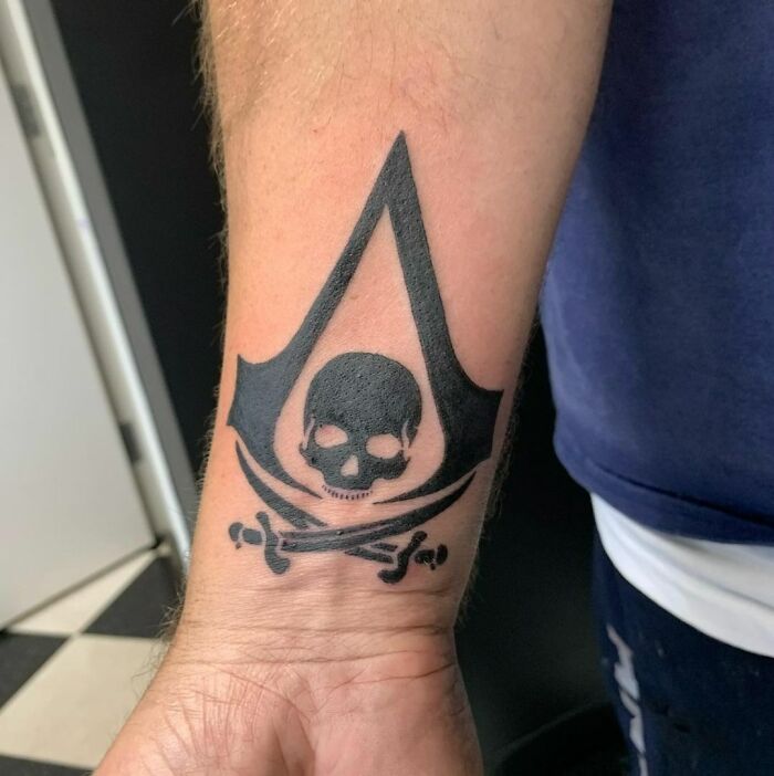 Assassin's Creed symbol tattoo