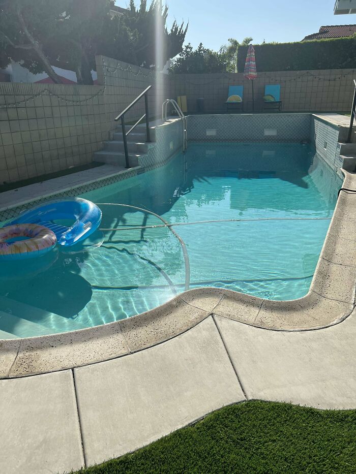 What Are These White Inset Tiles At The Deep End Of My Pool?