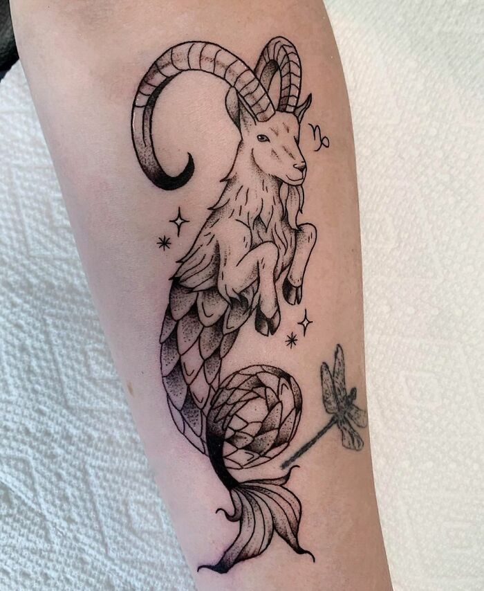 Capricorn arm tattoo