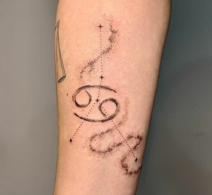 Cancer constellation arm tattoo