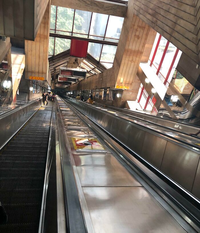 Very Long Escalator At The Subway Station In Chongqing, China
