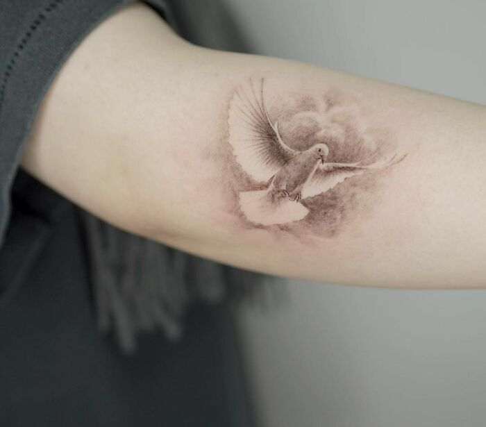 Dove elbow tattoo