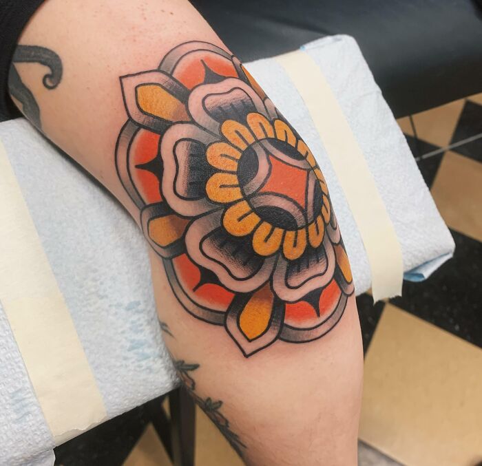 Watercolor elbow tattoo