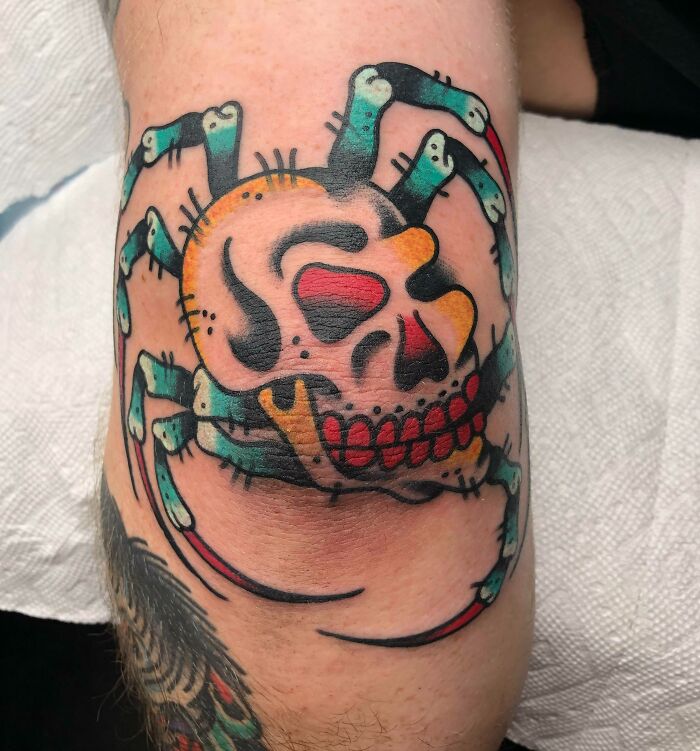 Skull elbow tattoo