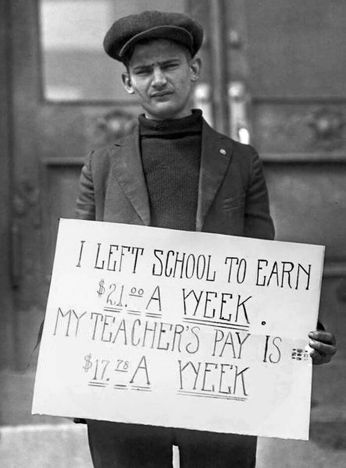 A Young Man Demonstrating Against Low Pay For Teachers, Ca. 1930. “I Left School To Earn $21 A Week. My Teacher’s Pay Is $17.78 A Week.” Photo: Paul Thompson