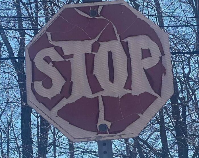A Stop Sign In My Town Is So Old It's Becoming A Metal Band Logo