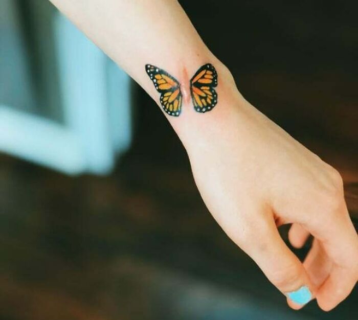 Scar Butterfly arm hand Tattoo