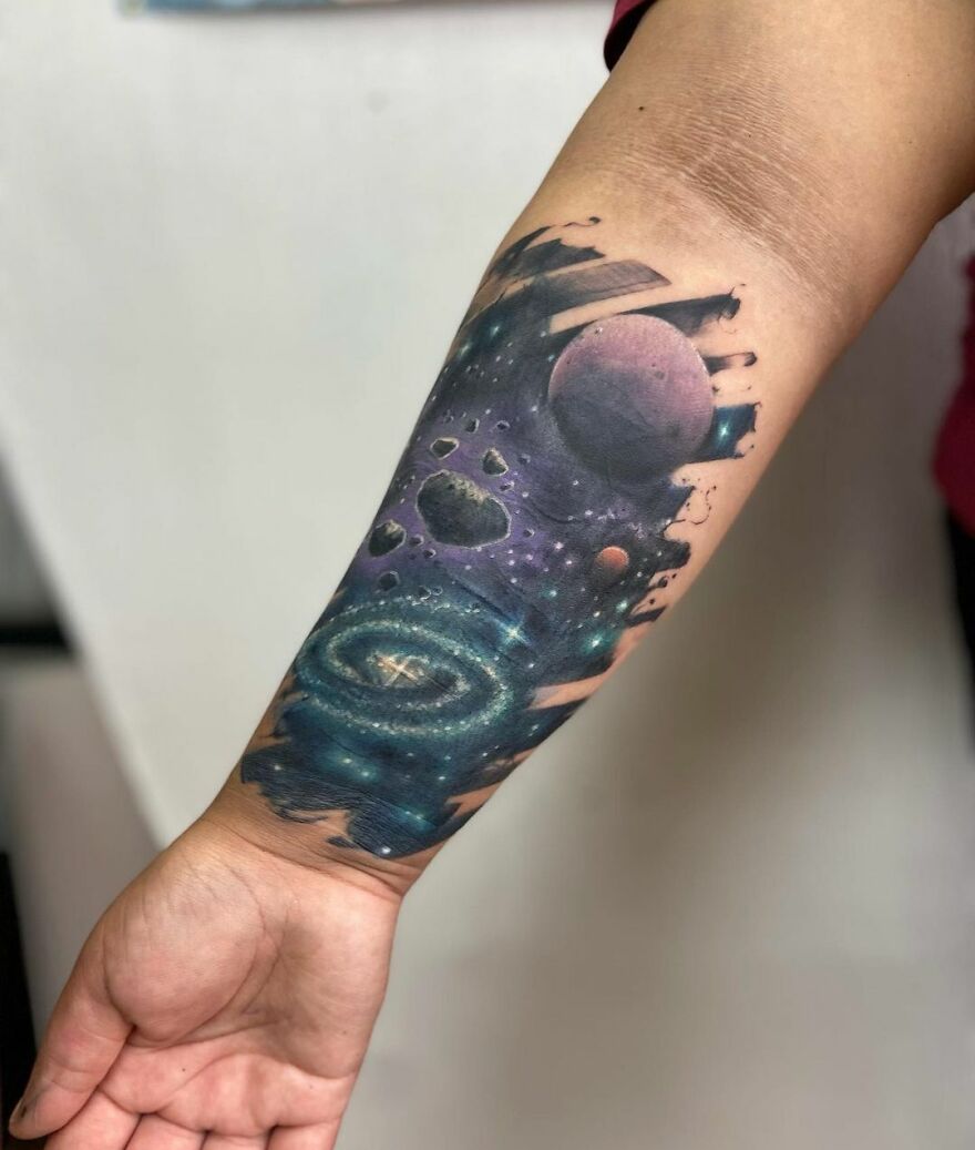 Galaxy forearm tattoo
