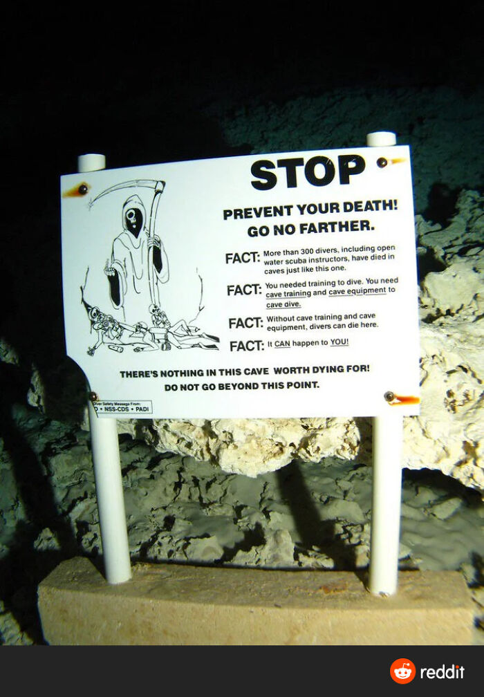 The Ultimate Funny Sign... Underwater! I Wonder What's In That Cave