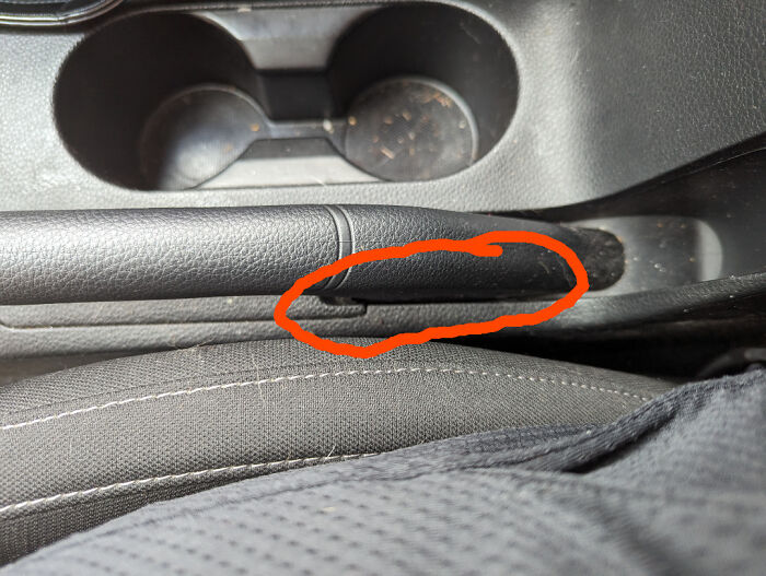 I Dropped My Debit Card, And It Went Straight Into The Tiny Opening Of The Parking Brake
