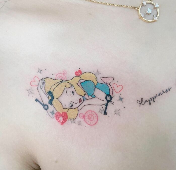 Alice In Wonderland collarbone tattoo