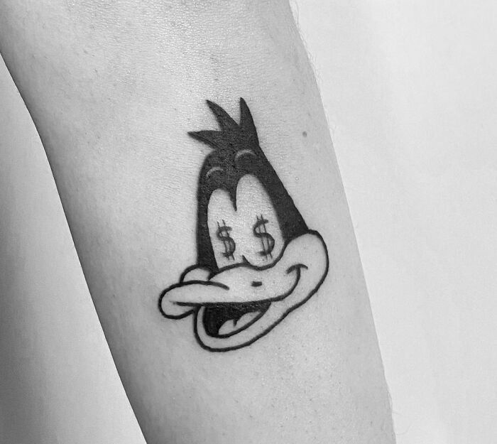 Daffy Duck from Looney Tunes tattoo